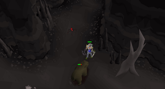 Fighting a grizzly bear in the Wilderness boss exit cave