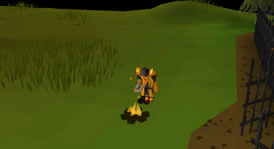 Lighting yew logs in the pyromancer outfit at the Skilling Zone (::firemaking) Safe area