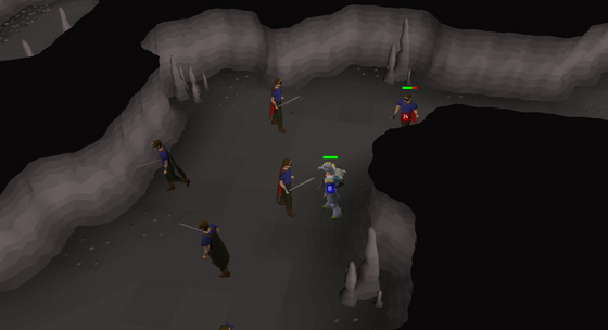 A gang of bandits closing in on the player in the Divine Slayer Cave