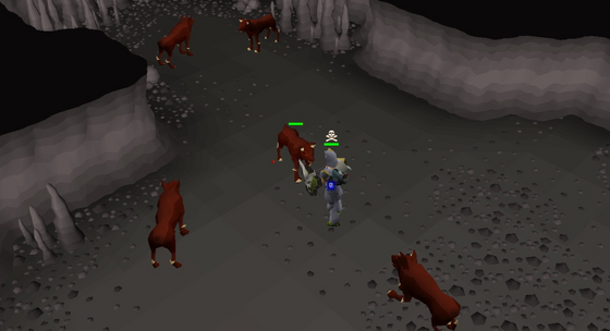 A pack of hellhounds surrounding the player in the Slayer Cave