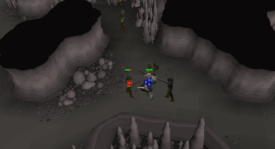 Ganged up on by dark warriors in the Slayer Cave