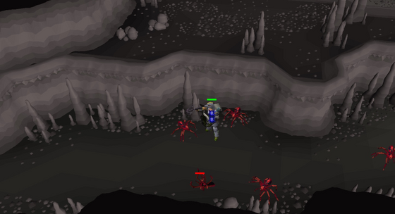 Deadly red spiders swarming the player on a Slayer Cave ledge