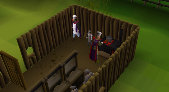 Cooking sharks on the Skilling Zone range (::cooking), next to the Cooking Tutor Safe area