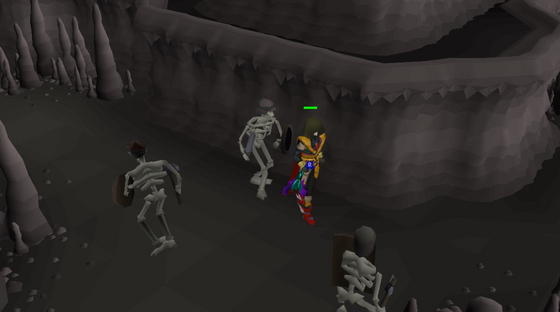 Surrounded by skeletons in the Slayer Cave