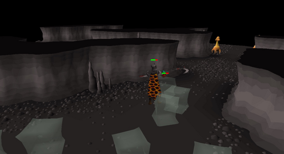 Fighting jellies in the Slayer Cave, Wilderness level 22, with dust devils further down the passage