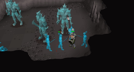 Ice warriors spearing at the player in the Divine Slayer Cave, ice giants behind