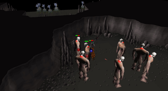 Fighting a pack of Nechryael in the Slayer Cave, Wilderness level 30, below the smoke devil ledge